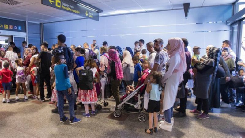 Refugiados llevando a España